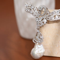 Baroque Pearl Swan Brooch – Elegant Hollow Design with Zircon Accents