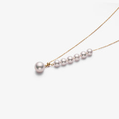 Fine Gold Necklace Featuring Asymmetrical Arrangement of Ocean Pearls