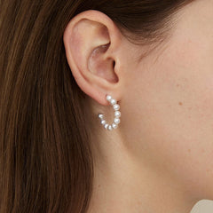 14K Gold Hoop Earrings with Cascading Freshwater Pearls – Sculpted Flow Design