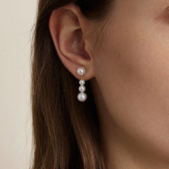 Handcrafted 14K Gold Earrings with Natural Pearl Cascade Design